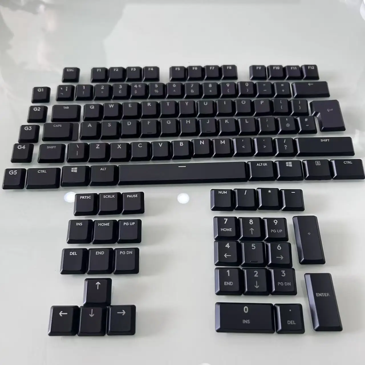 New backlit keycaps with EU US Germany layout, compatible with Logitech G913 G813 G815 G915 TKL mechanical keyboard
New backlit keycaps with EU US Germany layout, compatible with Logitech G913 G813 G815 G915 TKL mechanical keyboard
