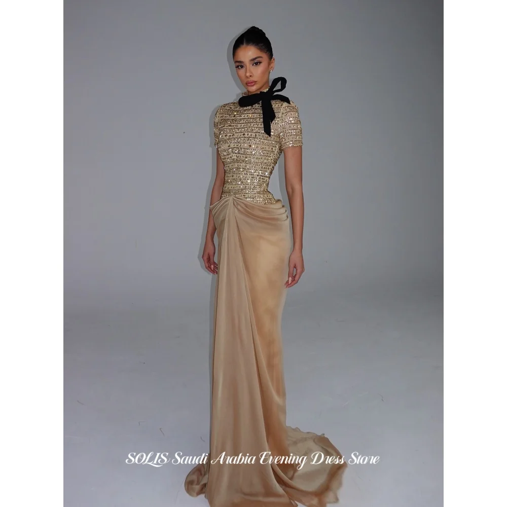 SOLIS Champagne High Neck Prom Dress Gold Beaded Evening Gown Draped Skirt with Black Bow Party Gown فستان سهرة نسائي Customized
SOLIS Champagne High Neck Prom Dress Gold Beaded Evening Gown Draped Skirt with Black Bow Party Gown فستان سهرة نسائي Customized