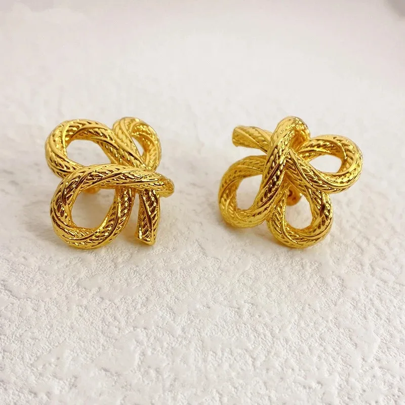 New Golden Female Earrings Female Knot Disorderly Braided Irregular Shape Temperament Earrings Jewelry Accessories Gift
New Golden Female Earrings Female Knot Disorderly Braided Irregular Shape Temperament Earrings Jewelry Accessories Gift