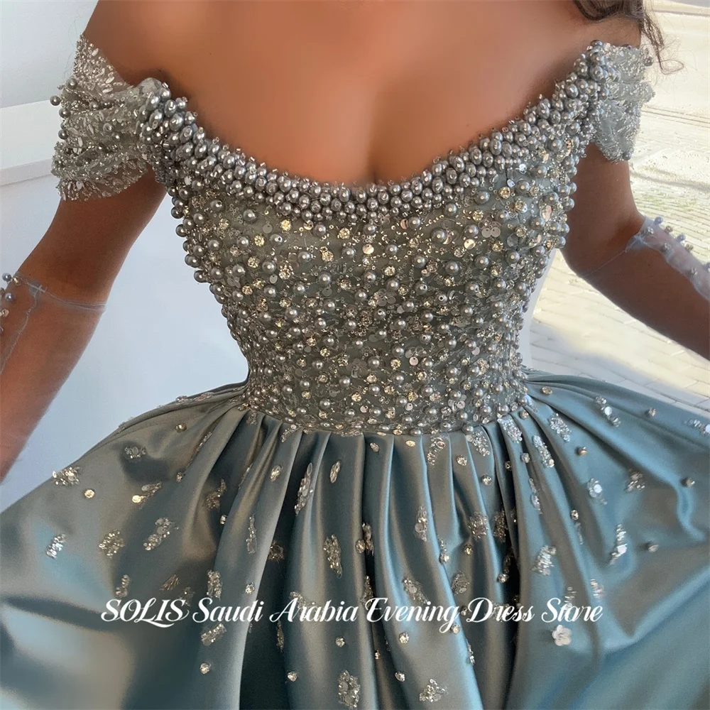 SOLIS Dusty Blue Off Shoulder Prom Dresses Short Sleeve Evening Dress Glitter Sequin Modern Style Pearls Formal Gown Customized
SOLIS Dusty Blue Off Shoulder Prom Dresses Short Sleeve Evening Dress Glitter Sequin Modern Style Pearls Formal Gown Customized