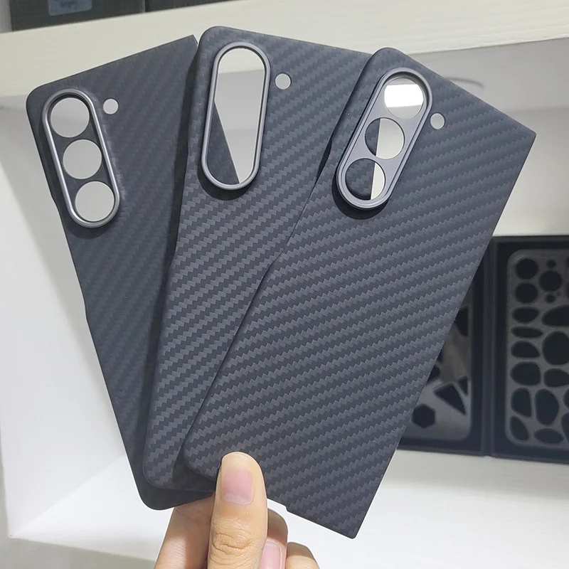 Premium Kevlar Carbon Fiber Phone Case Galaxy Z Fold 5 Fold5 Ultra Thin Metal Ring Camera Lens Protective Back Cover.
Premium Kevlar Carbon Fiber Phone Case Galaxy Z Fold 5 Fold5 Ultra Thin Metal Ring Camera Lens Protective Back Cover.