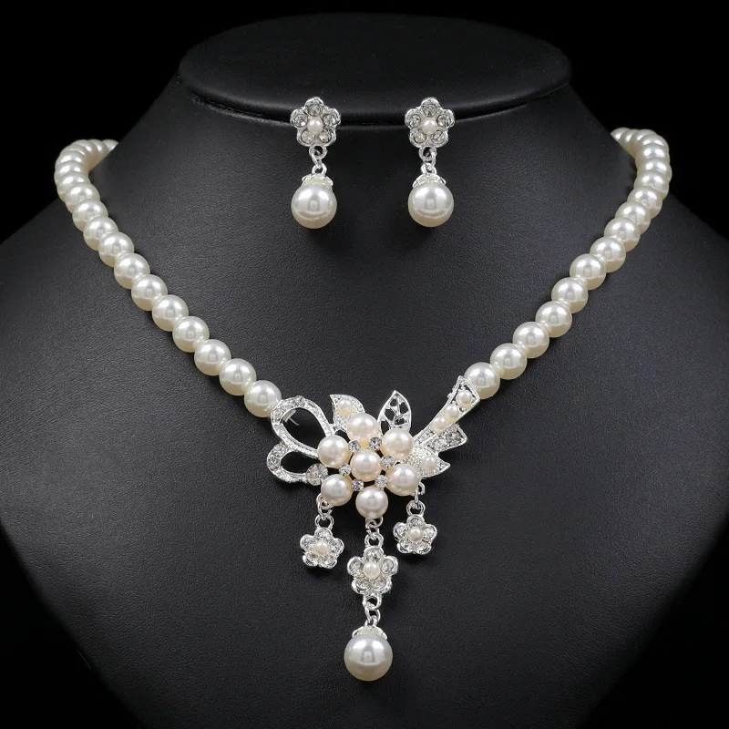 New Fashion Pearl Flower Necklace Earrings Set Hot Sale Women's Jewelry Alloy Electroplating
New Fashion Pearl Flower Necklace Earrings Set Hot Sale Women's Jewelry Alloy Electroplating