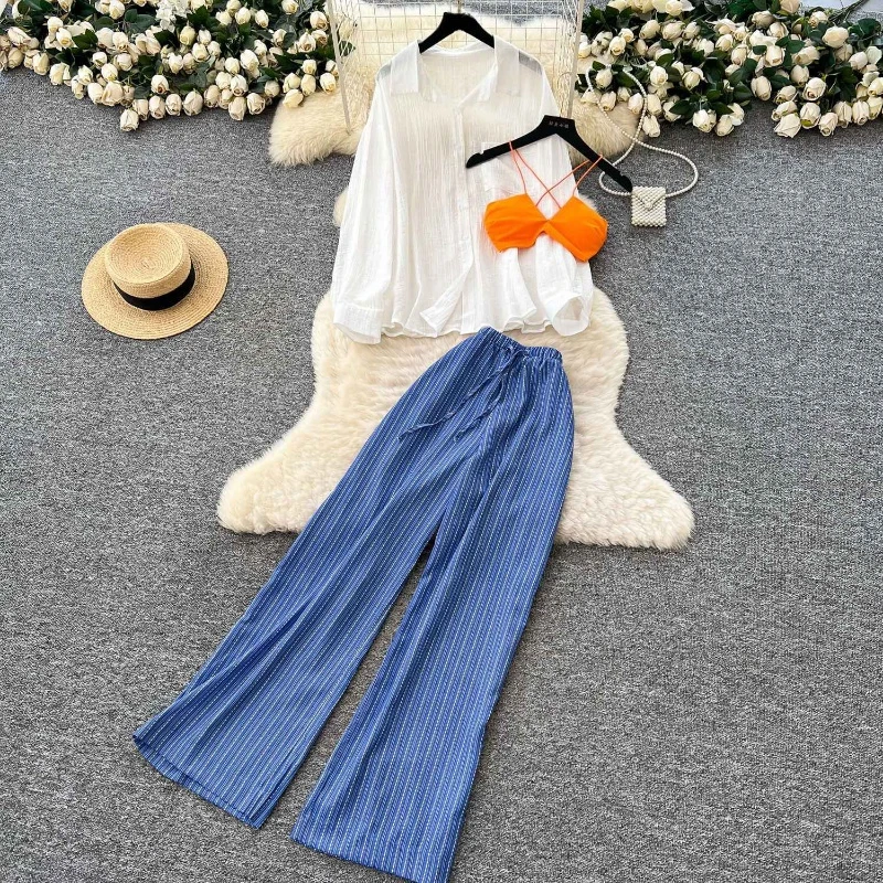 Beach vacation three piece set women's loose casual sun protection cover shirt+bikini camisole+striped wide leg pants
Beach vacation three piece set women's loose casual sun protection cover shirt+bikini camisole+striped wide leg pants