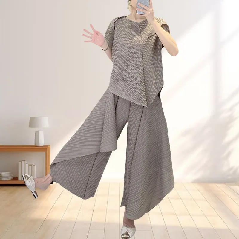 Miyake Women's Fashion T-shirt Set Summer Loose and Slim Irregular Solid Color Top Large Size Casual Wide Leg Pants 2 Piece Set
Miyake Women's Fashion T-shirt Set Summer Loose and Slim Irregular Solid Color Top Large Size Casual Wide Leg Pants 2 Piece Set