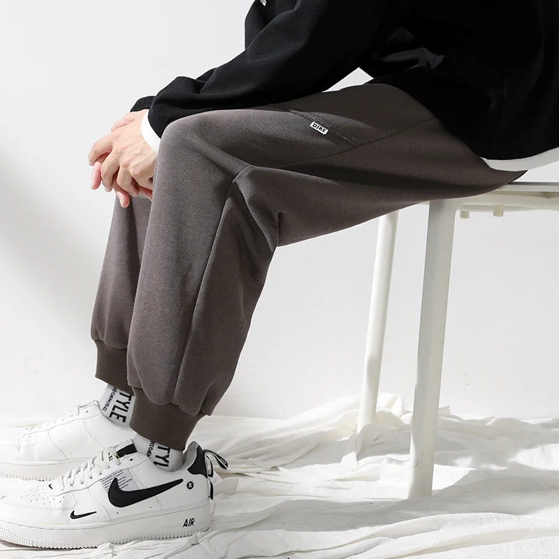 Sporty Casual Men's Loose Fit Running Pants Autumn Trendy Brand Simple Fashionable Trousers Polyester Micro Stretch Pure Color
Sporty Casual Men's Loose Fit Running Pants Autumn Trendy Brand Simple Fashionable Trousers Polyester Micro Stretch Pure Color