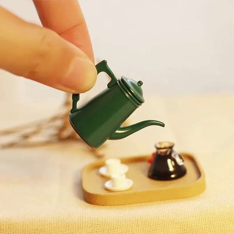 Mini Classic Teapot Model Hand-pouring Kettle Dollhouse Decor Accessories
Mini Classic Teapot Model Hand-pouring Kettle Dollhouse Decor Accessories