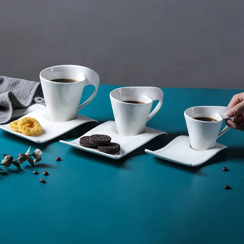European Wave Porcelain Coffee Cup and Saucer Set White Ceramic Coffee Cup Breakfast Cup with Saucer Modern Home Decoration
European Wave Porcelain Coffee Cup and Saucer Set White Ceramic Coffee Cup Breakfast Cup with Saucer Modern Home Decoration