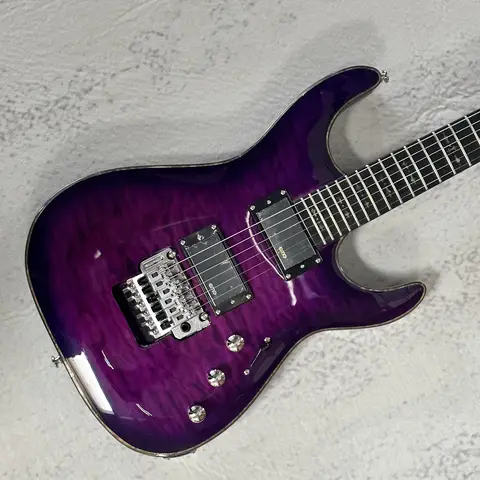 Purple six-string electric guitar, H-H pickup, vibrato system, high-quality tone