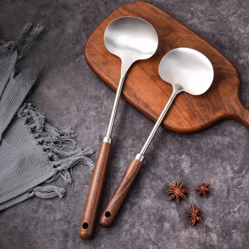 Food grade stainless steel spatula kitchen household cooking shovel special stir-fry spoon solid wood handle mushroom shovel
Food grade stainless steel spatula kitchen household cooking shovel special stir-fry spoon solid wood handle mushroom shovel