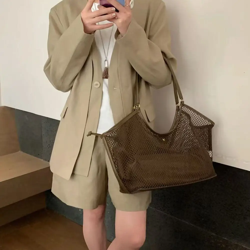 Casual Hollow Mesh Wing Tote Bag Woven PU Leather Large Capacity Net Handbag Underarm Bag Summer Beach Shoulder Bag Ladies
Casual Hollow Mesh Wing Tote Bag Woven PU Leather Large Capacity Net Handbag Underarm Bag Summer Beach Shoulder Bag Ladies