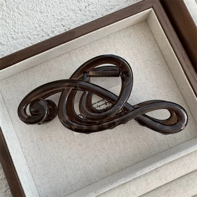 2026 Fashion Tea Color Musical Note Hair Claw Crab for Women Korean Vintage Large Size Ponytail Shark Hairpin Hair Accessories
2026 Fashion Tea Color Musical Note Hair Claw Crab for Women Korean Vintage Large Size Ponytail Shark Hairpin Hair Accessories