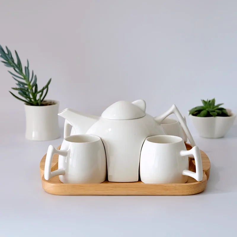 European Simple Creative Pure White Ceramic Tea Set Modern Fashion Living Room Teapot Tea Cup Tea Tray Bamboo Tray
European Simple Creative Pure White Ceramic Tea Set Modern Fashion Living Room Teapot Tea Cup Tea Tray Bamboo Tray