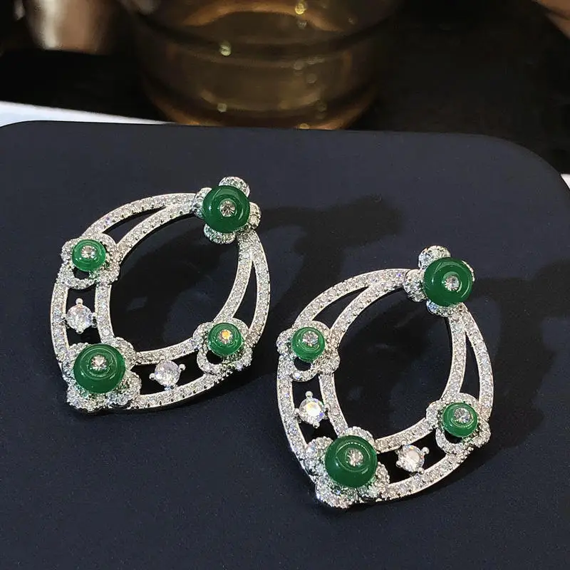 New green zircon earrings high-end vintage geometric Chinese style ethnic jewelry
New green zircon earrings high-end vintage geometric Chinese style ethnic jewelry