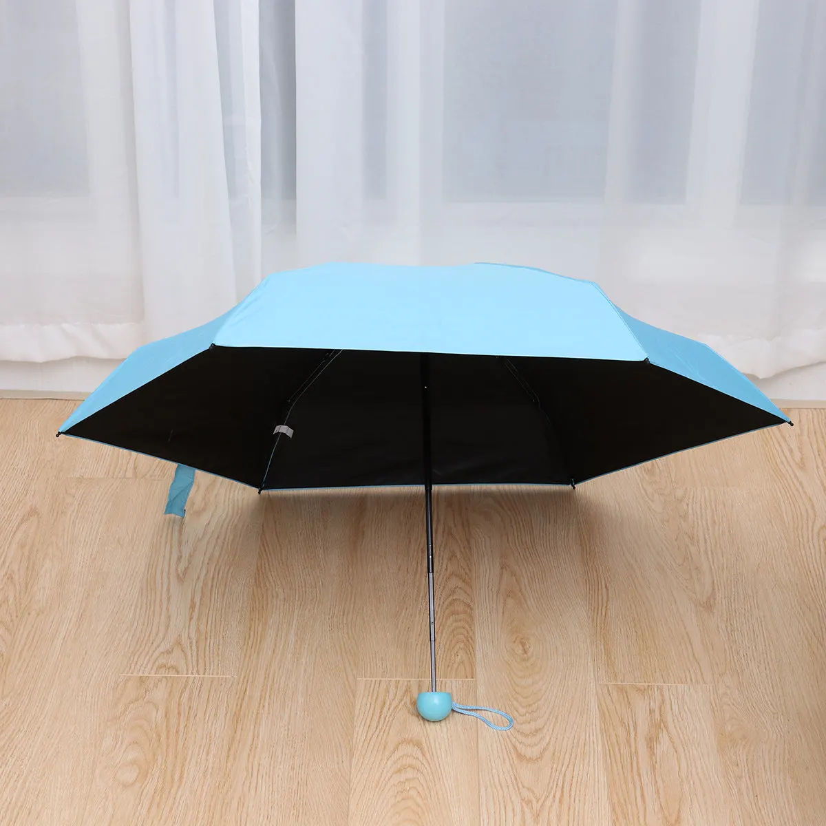 Small Foldable Mini Pocket Blue Compact Lightweight Anti-Uv 210T Fabric Capsule Case Windproof Rain Protection
Small Foldable Mini Pocket Blue Compact Lightweight Anti-Uv 210T Fabric Capsule Case Windproof Rain Protection