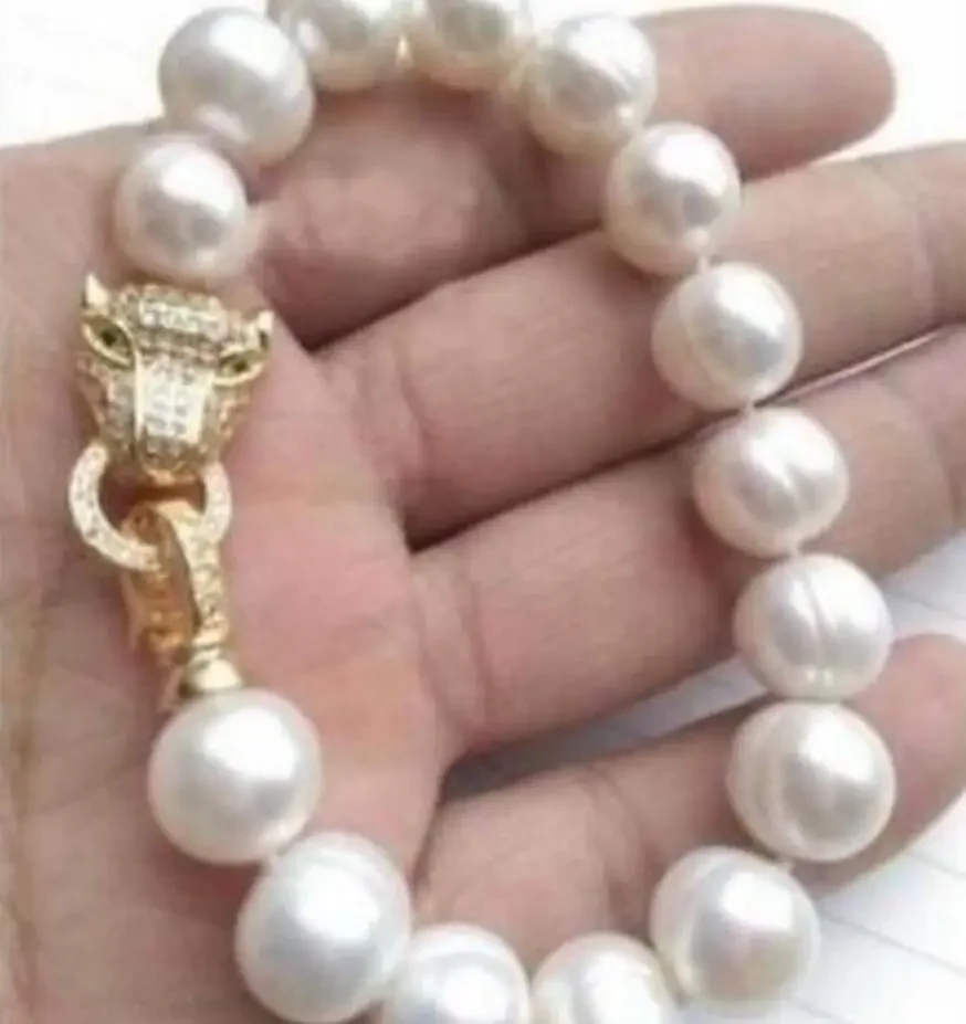 Натуральный новый браслет с головой леопарда 12-11 мм ЮЖНЫЕ МОРЕ белый ЖЕМЧУЖНЫЙ браслет ювелирные изделия 
Натуральный новый браслет с головой леопарда 12-11 мм ЮЖНЫЕ МОРЕ белый ЖЕМЧУЖНЫЙ браслет ювелирные изделия