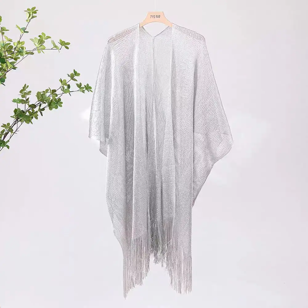 Womens Tassel Shawl Hollowed-out Seaside Cloak
Womens Tassel Shawl Hollowed-out Seaside Cloak