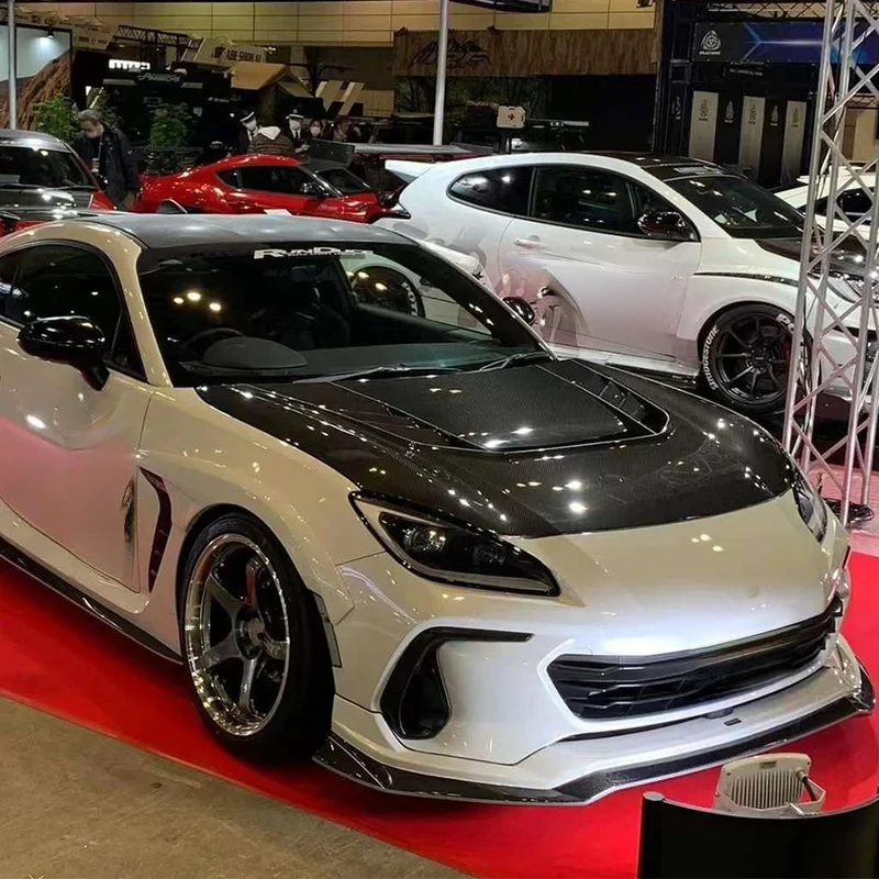 High Quality VRS Style Carbon Fiber Front Engine Hood Sports Coupe Cutout Cooling Design Gloss Easy Installation Exte
High Quality VRS Style Carbon Fiber Front Engine Hood Sports Coupe Cutout Cooling Design Gloss Easy Installation Exte