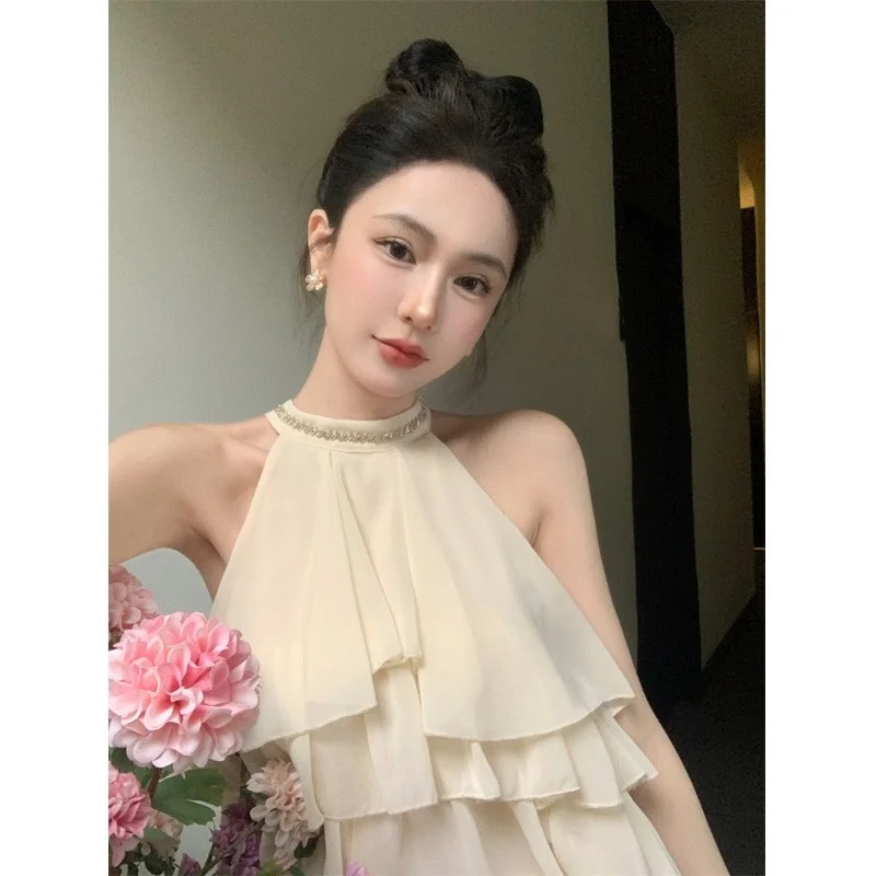 Hong Kong Style Slimming Summer New Arrival Women's Fashion Set Neck Hanging Sleeveless Chiffon Top Lantern Shorts Two-Piece Set
Hong Kong Style Slimming Summer New Arrival Women's Fashion Set Neck Hanging Sleeveless Chiffon Top Lantern Shorts Two-Piece Set