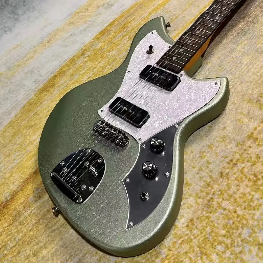 Metallic Green Electric Guitars Rosewood Fretboard Mahogany Body White Pearl Pickguard
Metallic Green Electric Guitars Rosewood Fretboard Mahogany Body White Pearl Pickguard