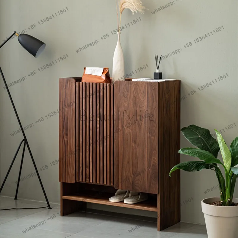 New Chinese-style North American black walnut Zen shoe cabinet entrance storage solid wood storage
New Chinese-style North American black walnut Zen shoe cabinet entrance storage solid wood storage