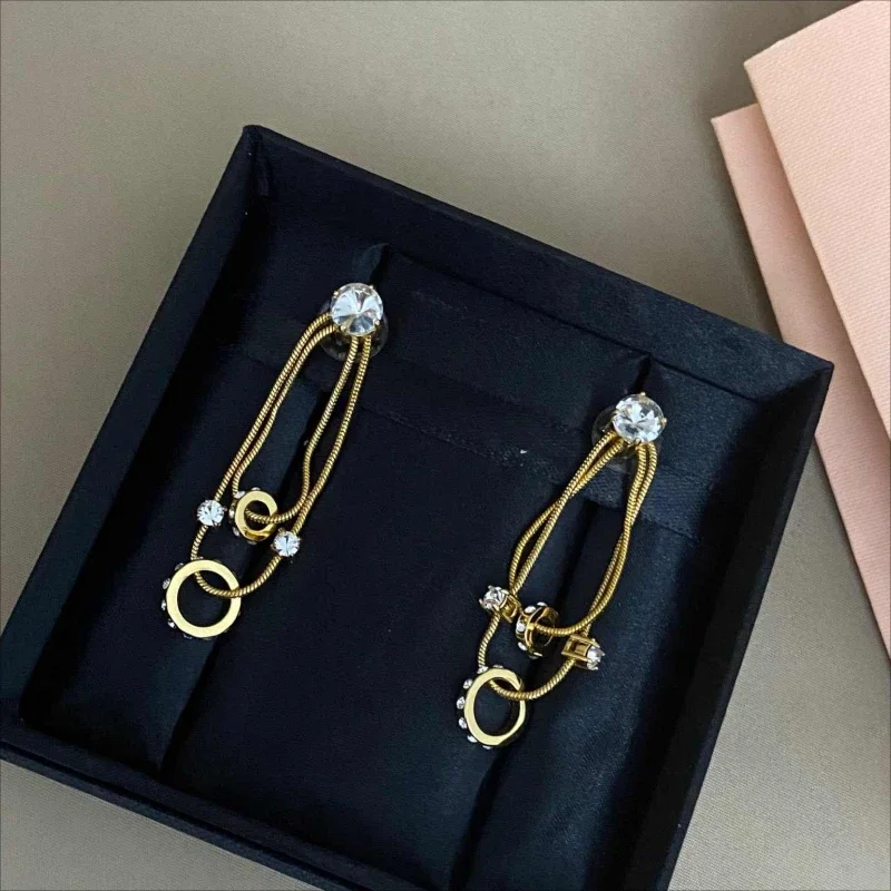 Europe America Fashion Designer Gold Crystal Tassel Earrings Women Sweet Romantic Luxury Jewelry Trend
Europe America Fashion Designer Gold Crystal Tassel Earrings Women Sweet Romantic Luxury Jewelry Trend