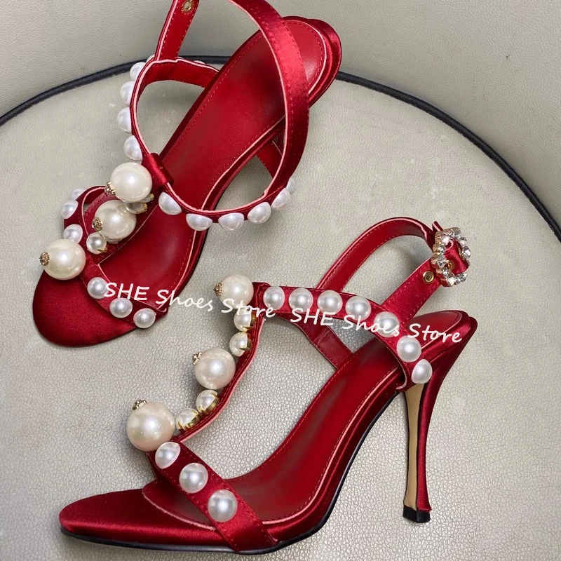 Luxury Pearl T-Strap Silk High Heel Women Sandals Peep Toe Narrow Band Stiletto Slingback Pumps Ladies Gladiator Dress Shoes
Luxury Pearl T-Strap Silk High Heel Women Sandals Peep Toe Narrow Band Stiletto Slingback Pumps Ladies Gladiator Dress Shoes