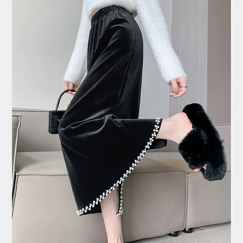 Velvet nail bead women's autumn and winter fleece high-waisted slimming back slit step retro mid-length hip-hugging skirt
Velvet nail bead women's autumn and winter fleece high-waisted slimming back slit step retro mid-length hip-hugging skirt