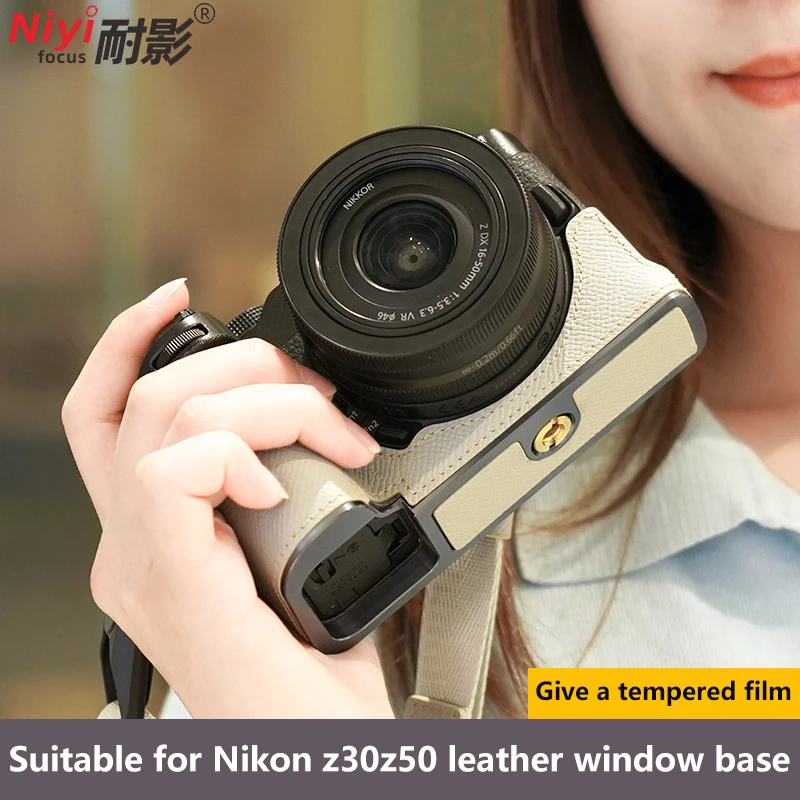 Чехол для фотоаппарата из натуральной кожи для Nikon Z30 Z50, сумка для фотоаппарата с принтом ладони, портативный с закаленной пленкой
Чехол для фотоаппарата из натуральной кожи для Nikon Z30 Z50, сумка для фотоаппарата с принтом ладони, портативный с закаленной пленкой