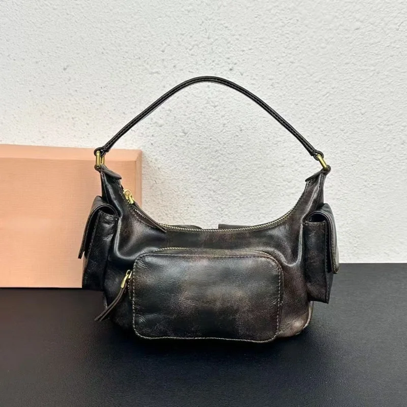 Italy genuine leather pocket motorcycle bag old hand-held hobo underarm bags retro one-shoulder handbag luxury women's bag
Italy genuine leather pocket motorcycle bag old hand-held hobo underarm bags retro one-shoulder handbag luxury women's bag