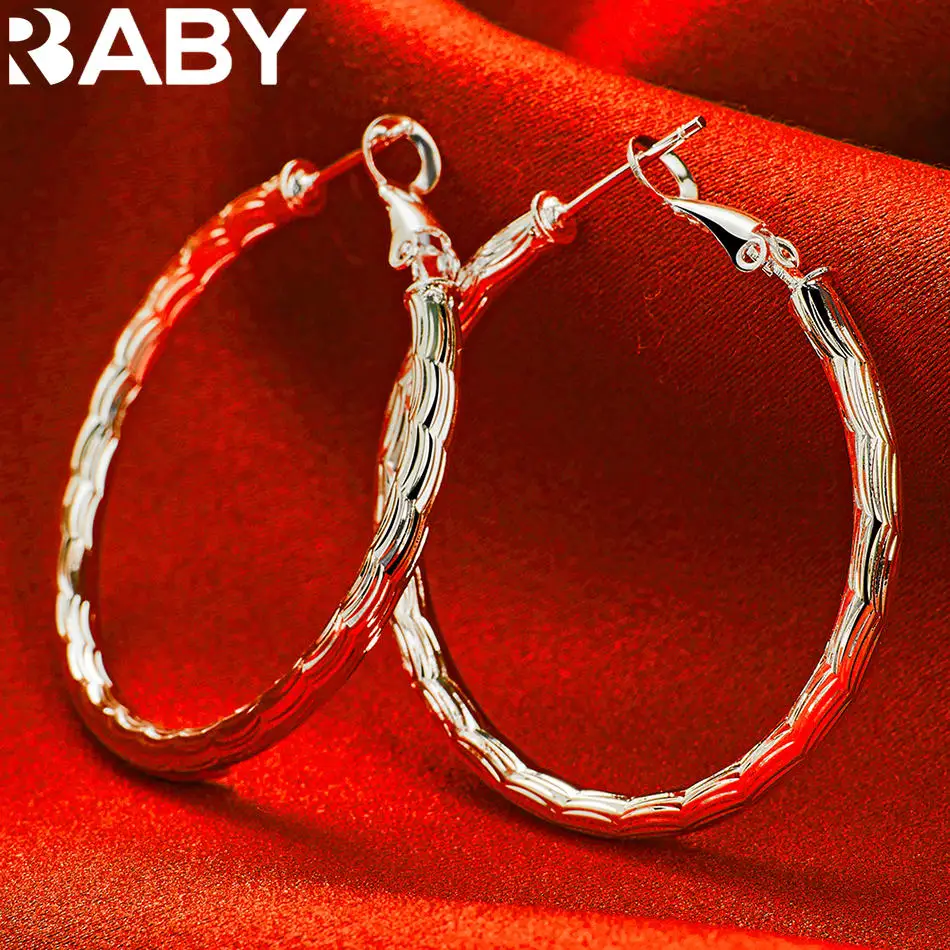 URBABY 925 Sterling Silver 40mm Wave Vein Hoop Earrings For Women Jewelry Wedding Engagement Party Charms Fashion Accessories
URBABY 925 Sterling Silver 40mm Wave Vein Hoop Earrings For Women Jewelry Wedding Engagement Party Charms Fashion Accessories
