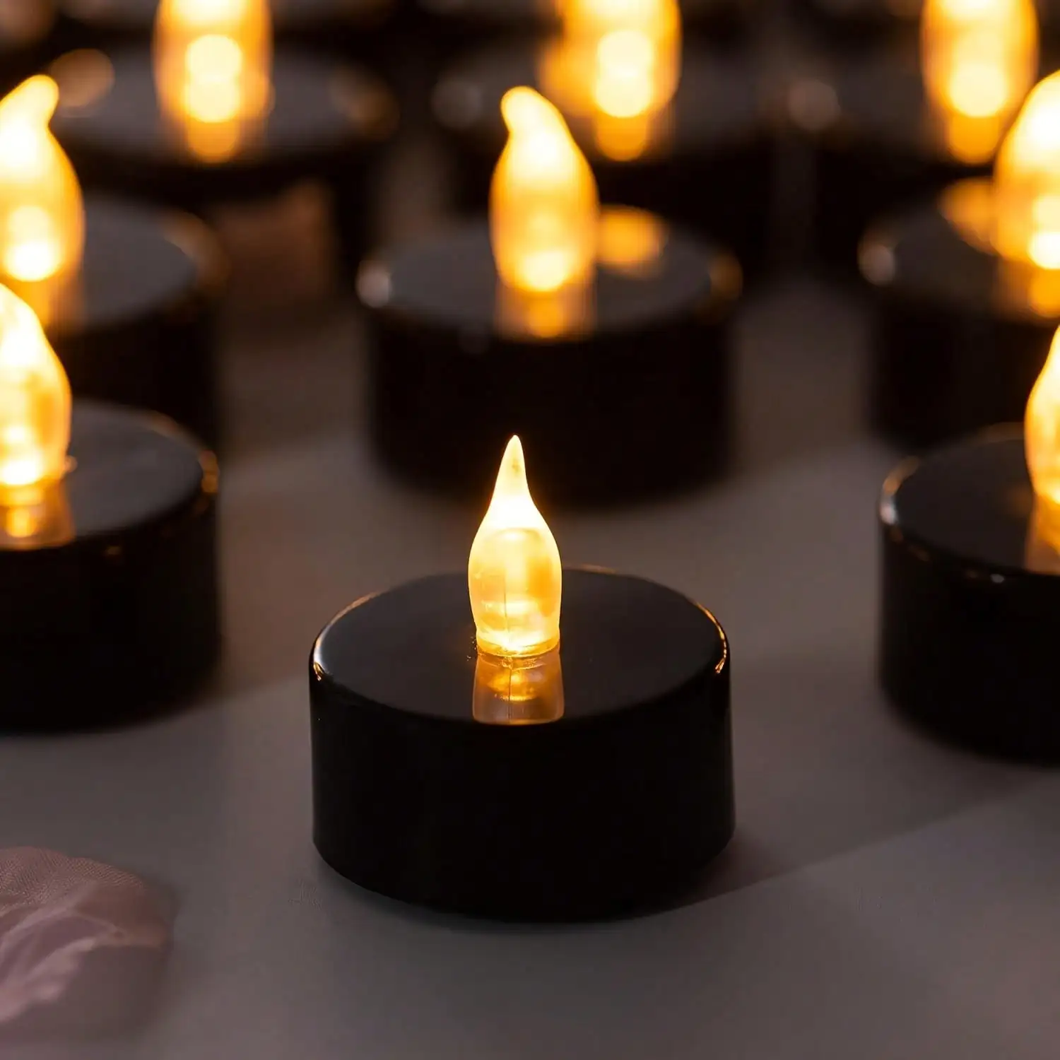 50 Pcs Long-Life Black LED Tea Lights, Flickering Flameless Battery Candles, Glossy Black Shell Spooky Halloween Decoration - Batteries Included
50 Pcs Long-Life Black LED Tea Lights, Flickering Flameless Battery Candles, Glossy Black Shell Spooky Halloween Decoration - Batteries Included