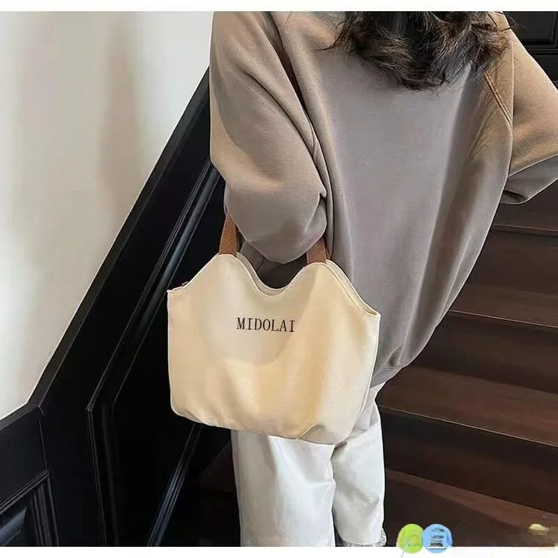 Casual Canvas Tote Bag Women's 2026 New Fashion Commuter Bag Large Capacity Single Shoulder Handbag Stylish Versatile Simple ...
Casual Canvas Tote Bag Women's 2026 New Fashion Commuter Bag Large Capacity Single Shoulder Handbag Stylish Versatile Simple ...