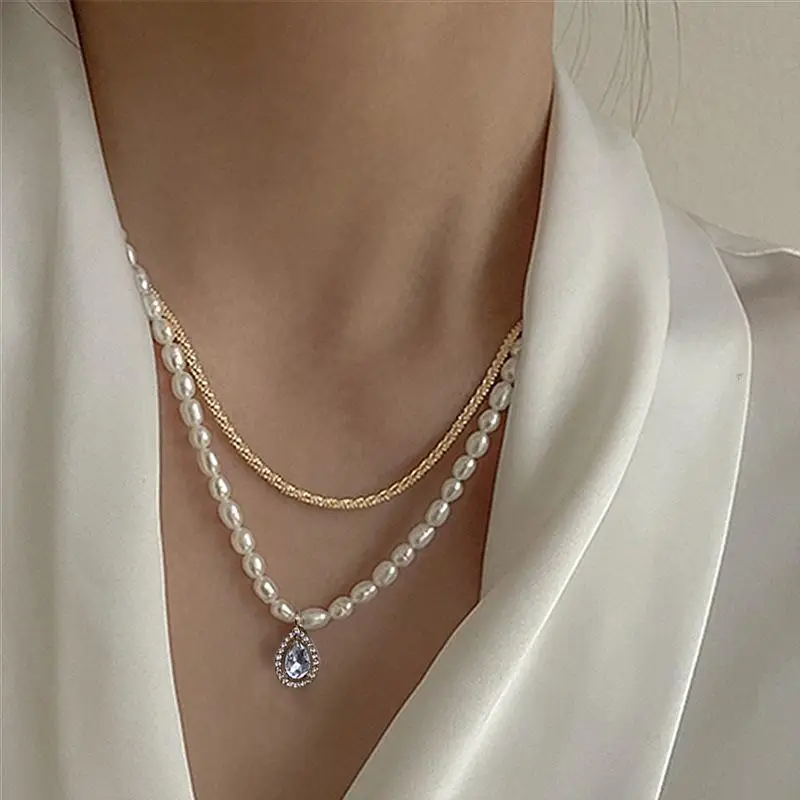 Faux Pearl Pendant Double Necklace Female Simple Temperament Wild Neck Chain Clavicle Chain
Faux Pearl Pendant Double Necklace Female Simple Temperament Wild Neck Chain Clavicle Chain