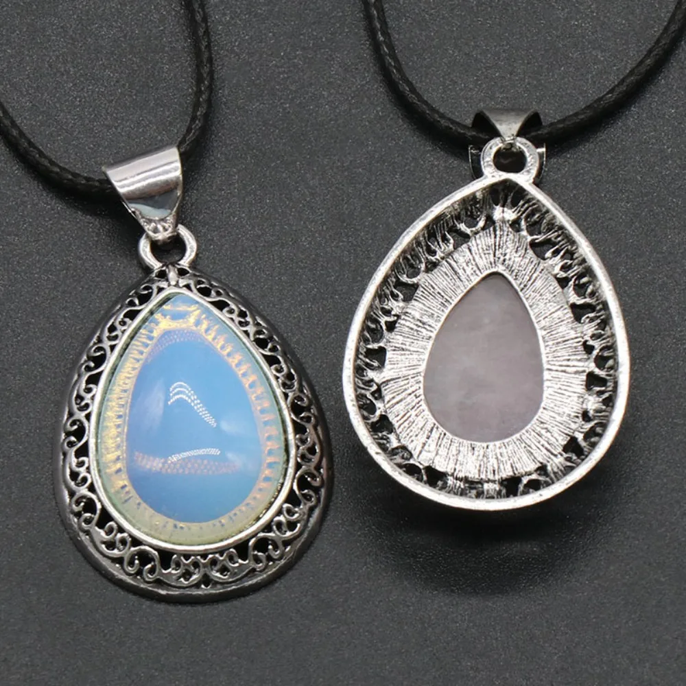 Antique Silver Plated Teardrop Natural Stone Pendant Necklace, Filigree Hollow Design, Adjustable Black Cord Jewelry for Women
Antique Silver Plated Teardrop Natural Stone Pendant Necklace, Filigree Hollow Design, Adjustable Black Cord Jewelry for Women