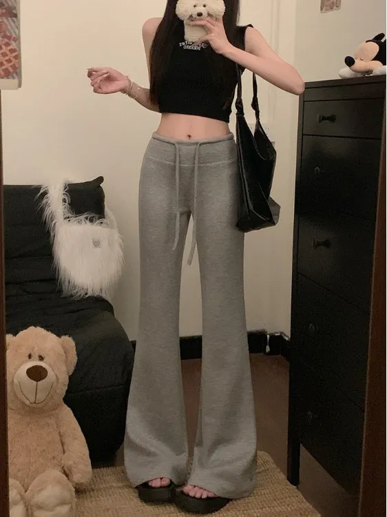 Женские повседневные брюки с низкой талией, микро-клеш, длина в пол, свободные, с эластичным поясом, в стиле Spicy Girl, модные
Женские повседневные брюки с низкой талией, микро-клеш, длина в пол, свободные, с эластичным поясом, в стиле Spicy Girl, модные