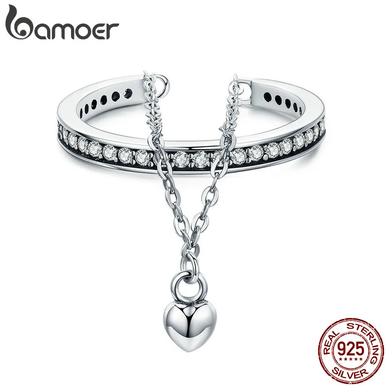 Женское Двухслойное кольцо BAMOER, регулируемое кольцо из 100% стерлингового серебра 925 пробы с прозрачным чешским сердечком
Женское Двухслойное кольцо BAMOER, регулируемое кольцо из 100% стерлингового серебра 925 пробы с прозрачным чешским сердечком