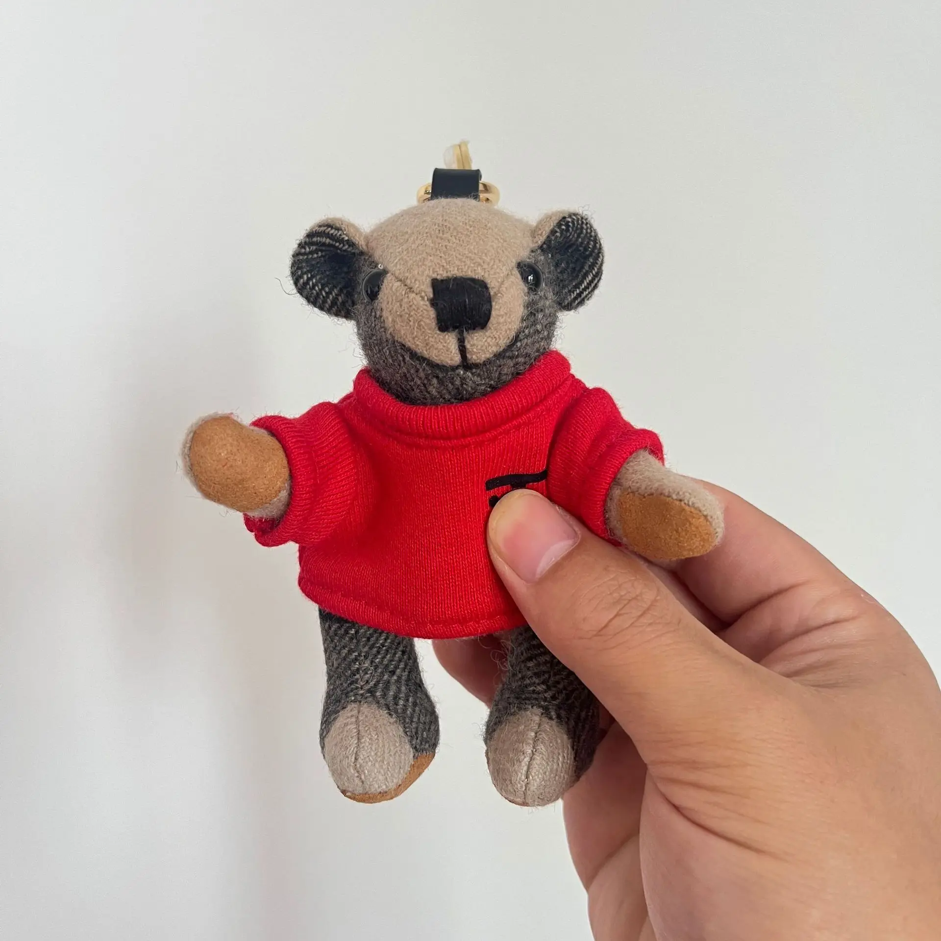Bear home pendant cashmere T-shirt shape teddy bear car keychain car hanging couple bag pendant
Bear home pendant cashmere T-shirt shape teddy bear car keychain car hanging couple bag pendant
