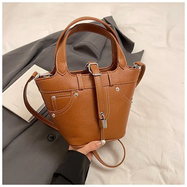Bucket Bag 2025 Summer New PU shoulder bag niche Korean fashion women handbag exquisite and small bag
Bucket Bag 2025 Summer New PU shoulder bag niche Korean fashion women handbag exquisite and small bag