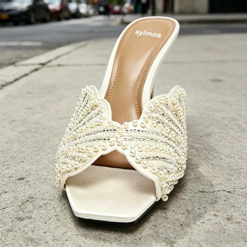 Luxury Faux Pearl Backless High-heel Sandals Women Fashion Square Open Toe Stiletto Slippers Elegant Wedding Bride Slides Shoes
Luxury Faux Pearl Backless High-heel Sandals Women Fashion Square Open Toe Stiletto Slippers Elegant Wedding Bride Slides Shoes