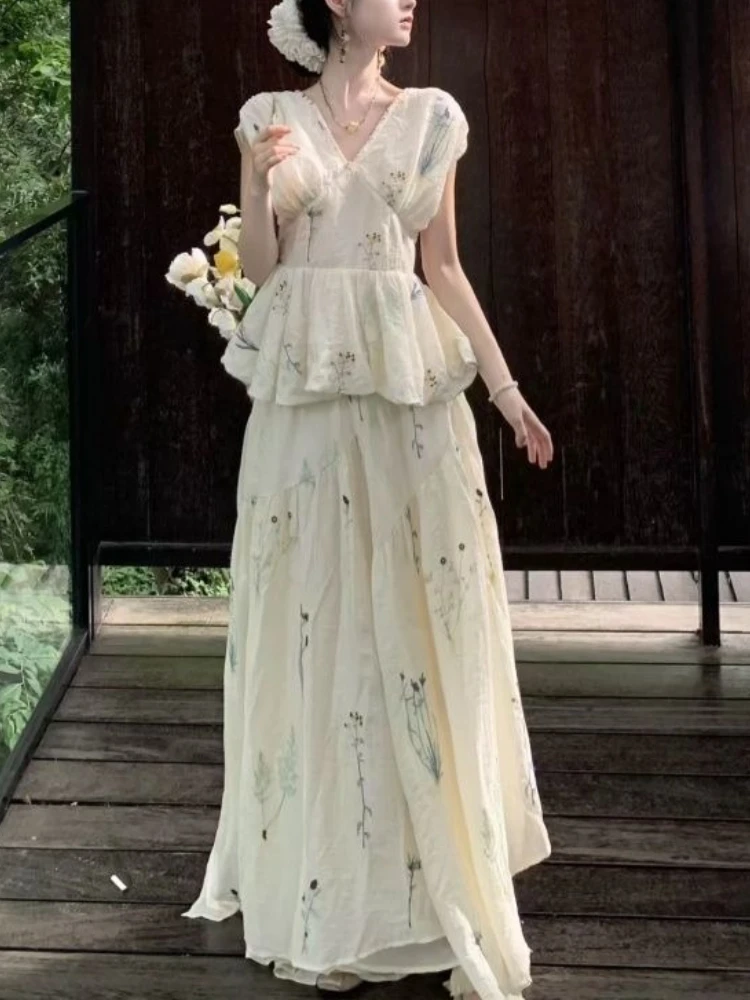 Sweet French Elegant Women 2 Piece Sets Vintage V-neck DesignTops + High Waist Irregular Skirt Casual Female Print Chic Outfits 
Sweet French Elegant Women 2 Piece Sets Vintage V-neck DesignTops + High Waist Irregular Skirt Casual Female Print Chic Outfits