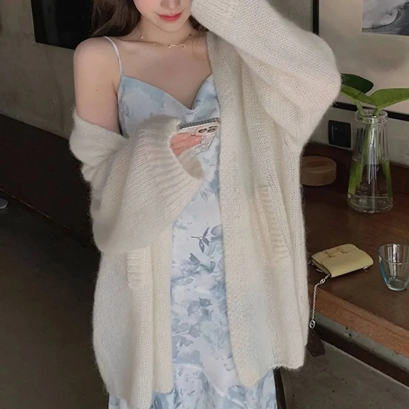 Новинка 202, осенне-зимний женский простой корейский женский вязаный роскошный вязаный кардиган средней длины, свитер, куртка
Новинка 202, осенне-зимний женский простой корейский женский вязаный роскошный вязаный кардиган средней длины, свитер, куртка