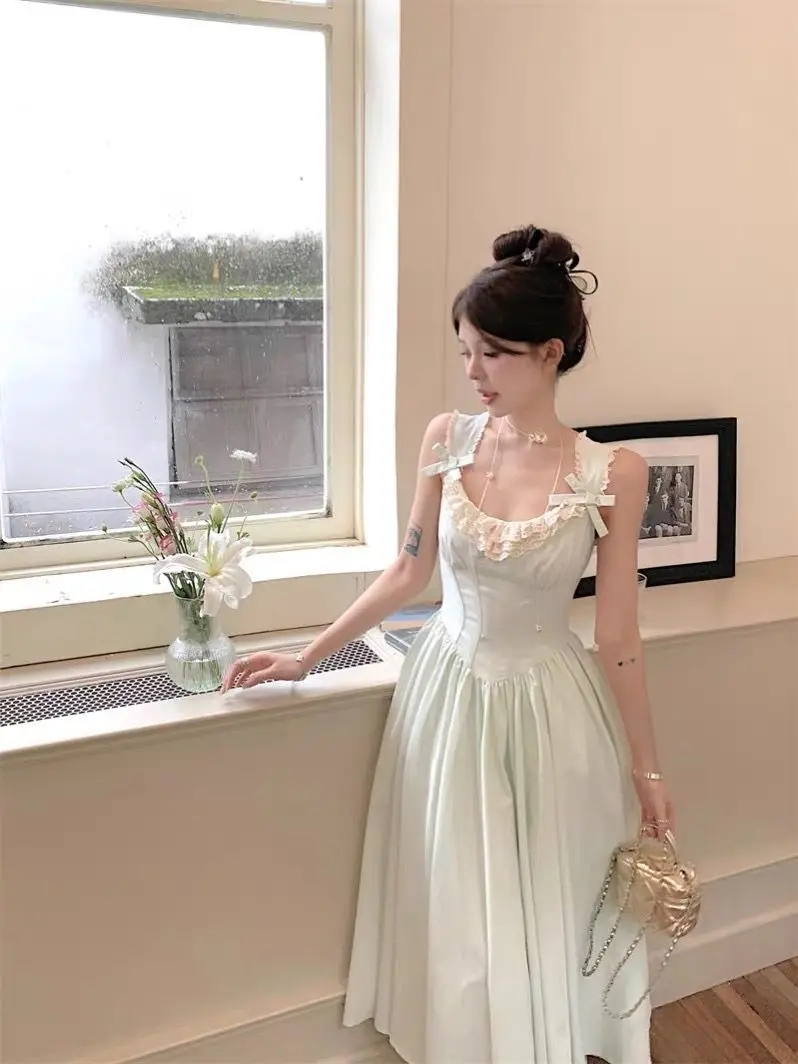 Sweet Hot Girl Bow Off-shoulder Sleeveless Spliced Lace Suspender Dress Women's Summer Slim Temperament Long Camisole Dresses
Sweet Hot Girl Bow Off-shoulder Sleeveless Spliced Lace Suspender Dress Women's Summer Slim Temperament Long Camisole Dresses
