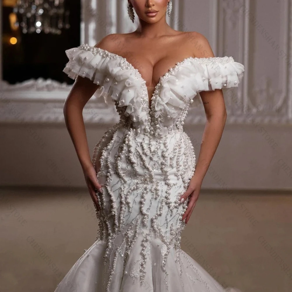 Chic Off Shoulder Mermaid Wedding Dresses Sequined Pearls Ruffle Train Bridal Gowns Illusion Custom Made Vestidos De Novia
Chic Off Shoulder Mermaid Wedding Dresses Sequined Pearls Ruffle Train Bridal Gowns Illusion Custom Made Vestidos De Novia