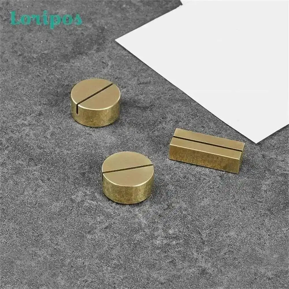 Brass Retro Business Card Holder Memo Display Stand Photo Clip Metal Vertical Label Stand Suitable for Home and Office Use
Brass Retro Business Card Holder Memo Display Stand Photo Clip Metal Vertical Label Stand Suitable for Home and Office Use