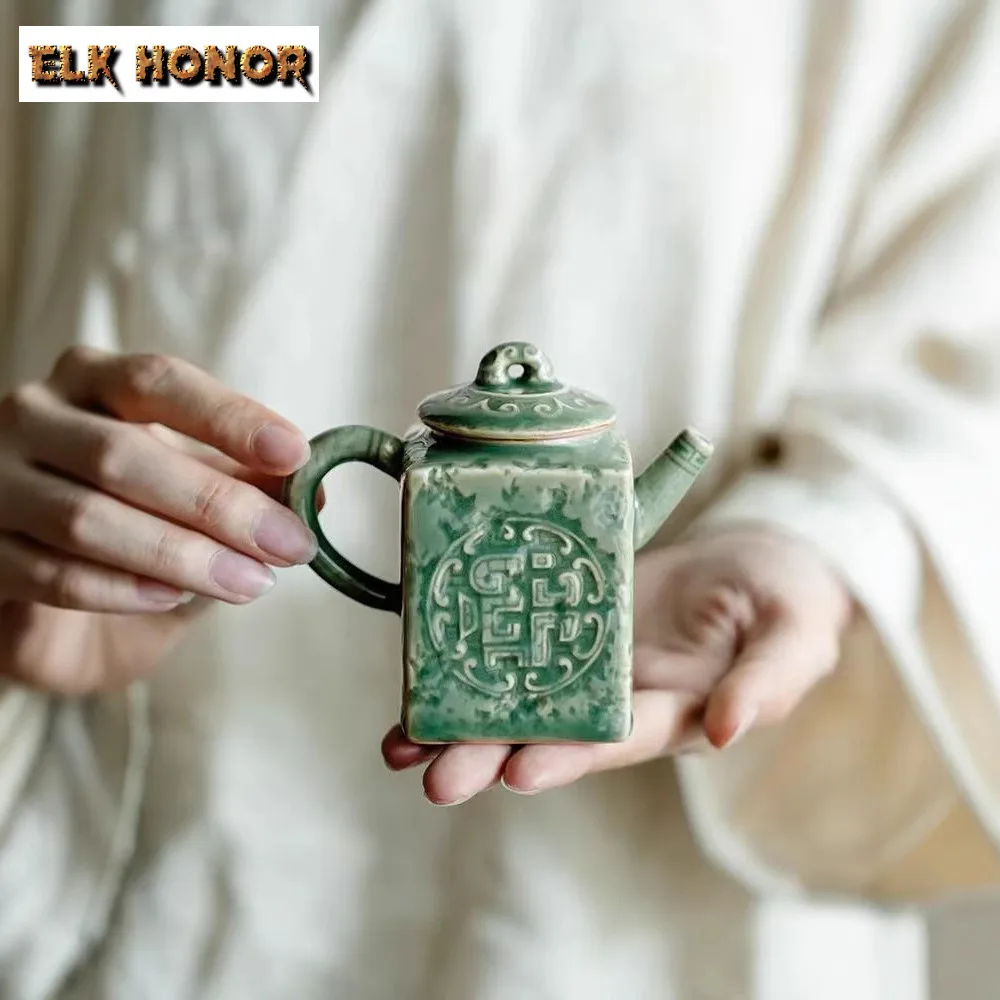130 мл Yue Kiln Celadon квадратный чайник бутик чайник для заварки чая чайник с шариковым отверстием чайные услуги поставки украшения
130 мл Yue Kiln Celadon квадратный чайник бутик чайник для заварки чая чайник с шариковым отверстием чайные услуги поставки украшения