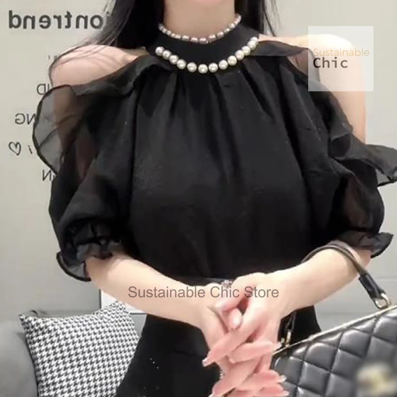 French heavy industry beaded round neck strapless shirt women's summer new gentle wind fashion temperament slim chic shirt top.
French heavy industry beaded round neck strapless shirt women's summer new gentle wind fashion temperament slim chic shirt top.