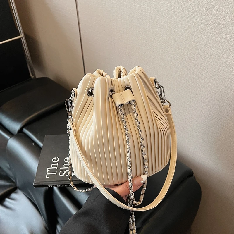 Brand Design PU Leather Shoulder Bag Fashion Pleated Stripe Bucket Bag Ladies Mini Small Crossbody Bag Women Simple Handbag
Brand Design PU Leather Shoulder Bag Fashion Pleated Stripe Bucket Bag Ladies Mini Small Crossbody Bag Women Simple Handbag