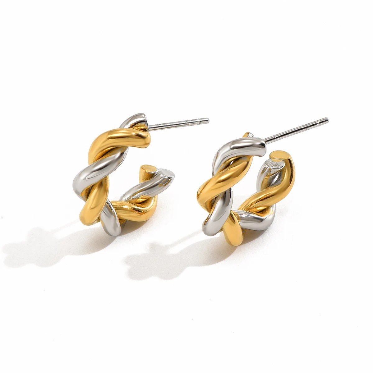 E04 Fashion Jewelry Classic mini two-tone twist twist stylish stainless steel earrings
E04 Fashion Jewelry Classic mini two-tone twist twist stylish stainless steel earrings