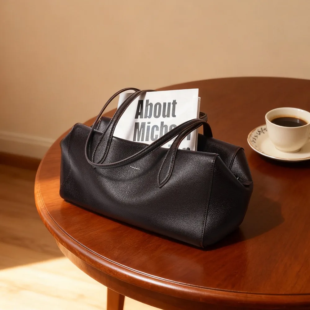 Bowling Hot Pillow New Commuter Handbag Women's Leather Shoulder Bag Loose Casual Fashion Versatile Senior Texture Simple
Bowling Hot Pillow New Commuter Handbag Women's Leather Shoulder Bag Loose Casual Fashion Versatile Senior Texture Simple