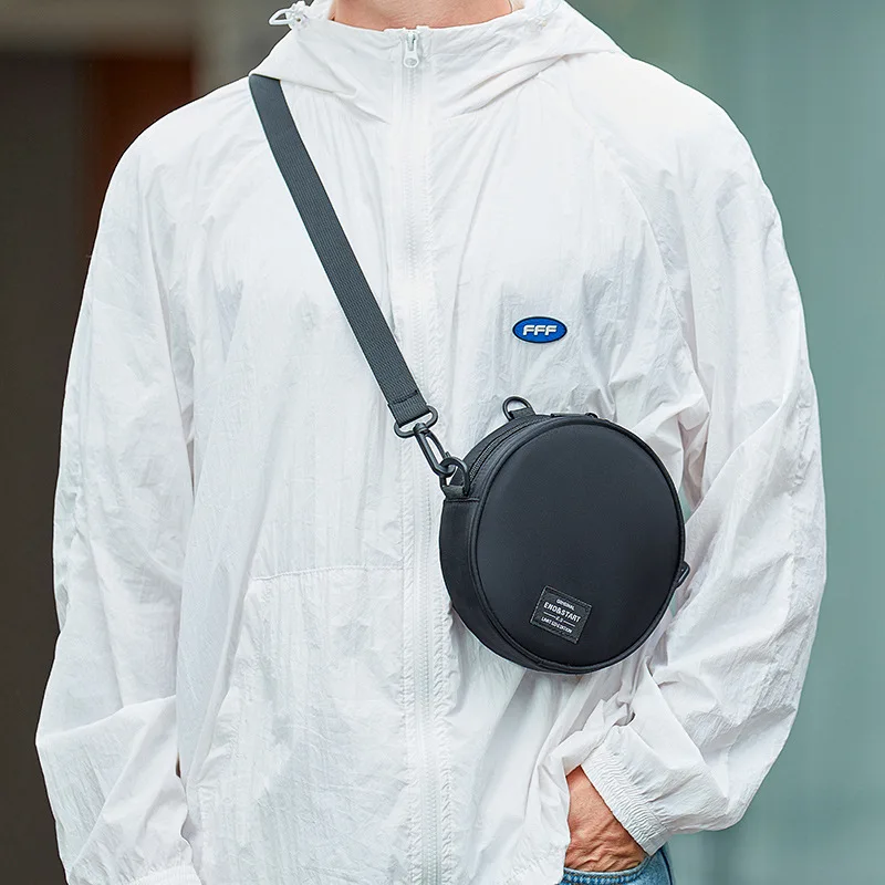 Fashion Brand Small Shoulder Mobile Bags for Man 2025 New Men's Casual Round Crossbody Bag Nylon Cloth Handbag High Quality
Fashion Brand Small Shoulder Mobile Bags for Man 2025 New Men's Casual Round Crossbody Bag Nylon Cloth Handbag High Quality